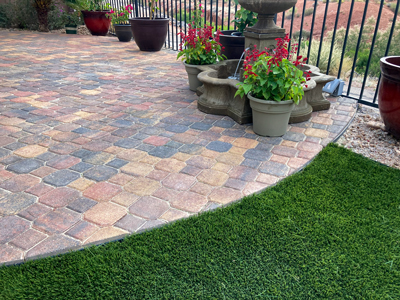 Backyard paver patio landscaping in Ivins, Utah